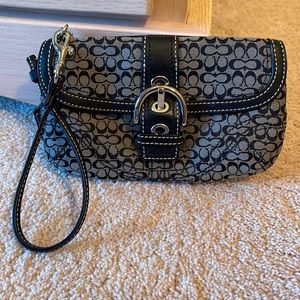 Black and grey coach wristlet